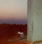 Girl Watching Sunset at Guidestones